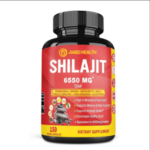 A bottle of JiaBei Health Shilajit 6550mg Vegan Capsules with a red and yellow label. The label highlights ingredients like "Ashwagandha + Ginseng + Saw Palmetto + Maca + Tribulus Terrestris + Chaga Mushroom + Black Pepper." Key benefits listed are "High in Minerals & Fulvic Acid," "Supports Memory & Brain Function," "Supports Immune System," and "Encourages Healthy Aging." It also indicates "150 Vegan Capsules" and "Equivalent to 6550mg powder".