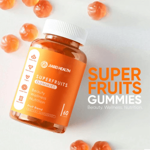 Plant-based superfruits gummies bottle with scattered gummies, supporting beauty, wellness, and nutrition