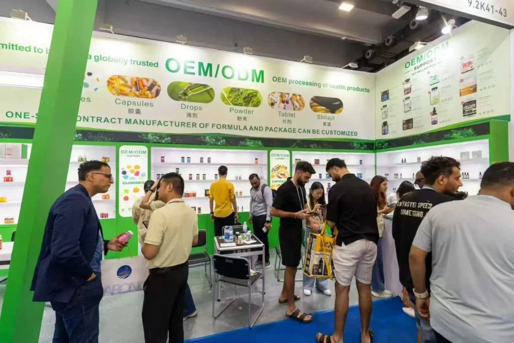 Visitors exploring Jiabei Health’s OEM/ODM supplement booth at the Middle East Organic Natural Expo 2025 in Dubai
