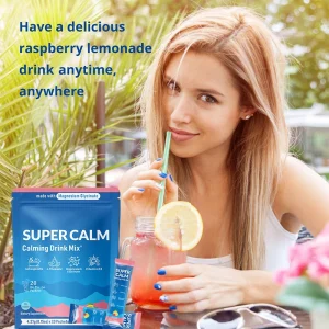 woman drinking raspberry lemonade calming drink mix powder magnesium glycinate supplement beverage