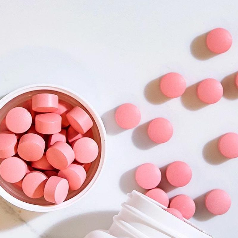 Assorted tablets and pills highlighting our custom tablet supplement manufacturing services.